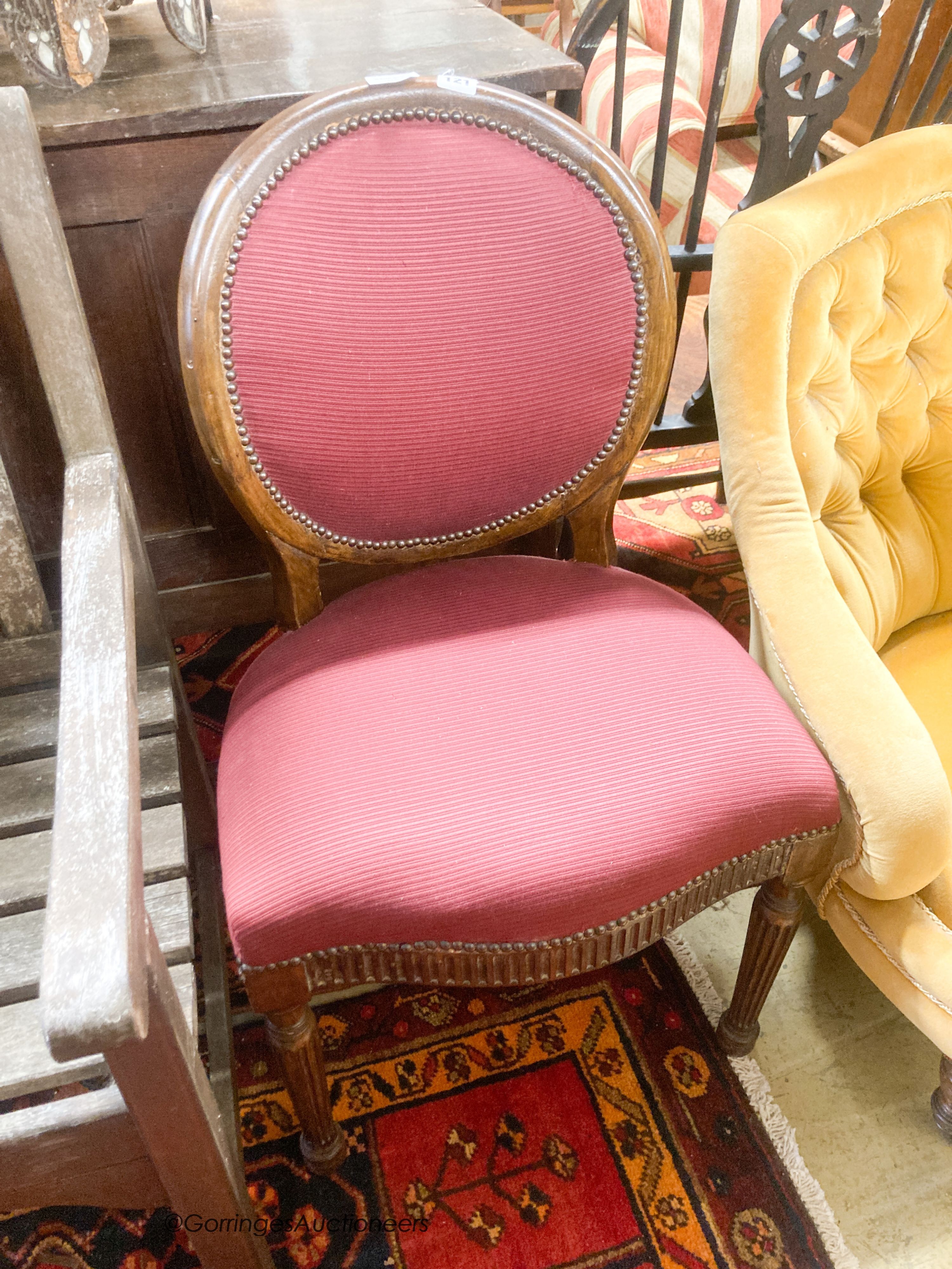 A Louis XV side chair (formerly gilded) and a Victorian buttoned gold dralon nursing chair (2)